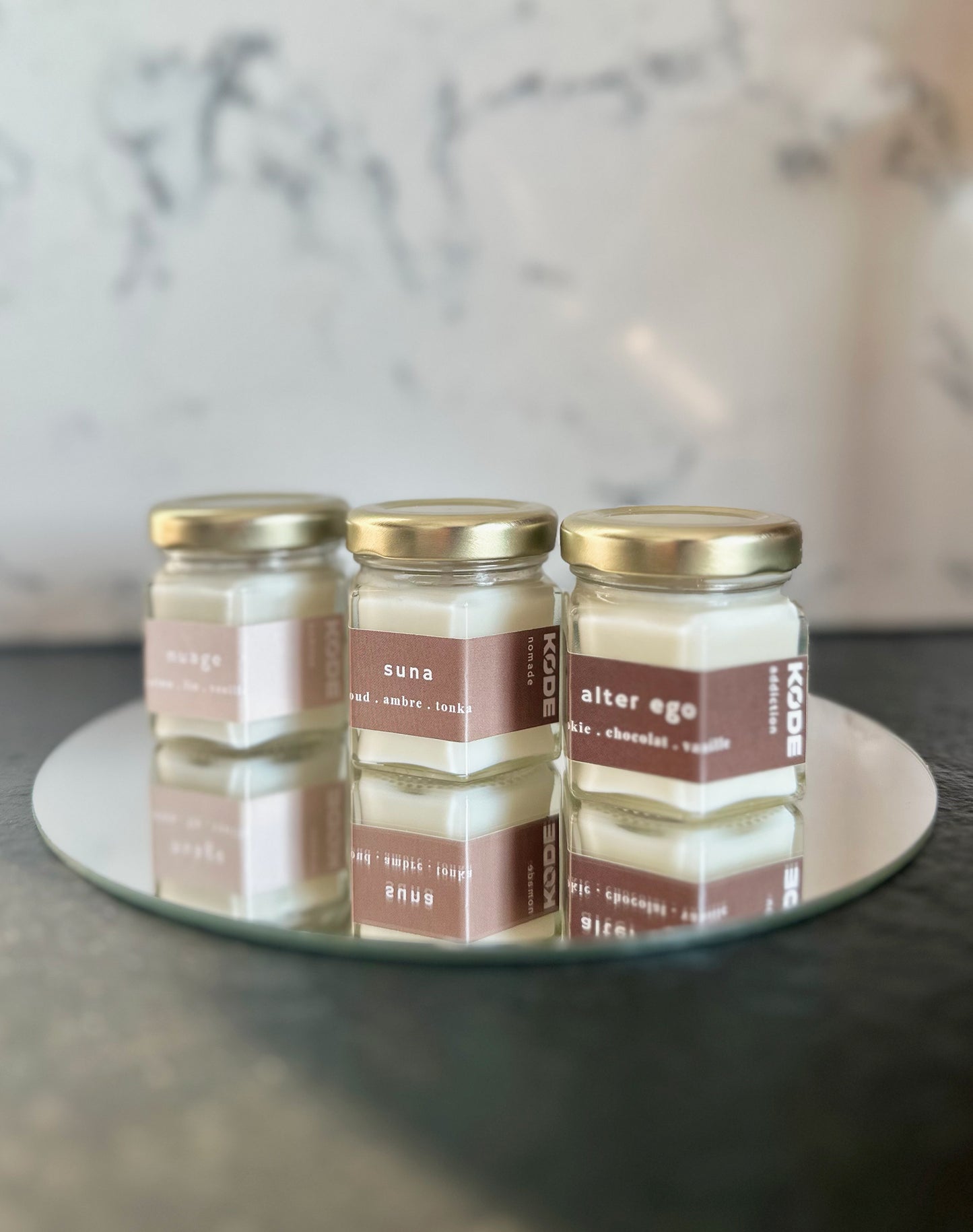 Trois mini bougies parfumées