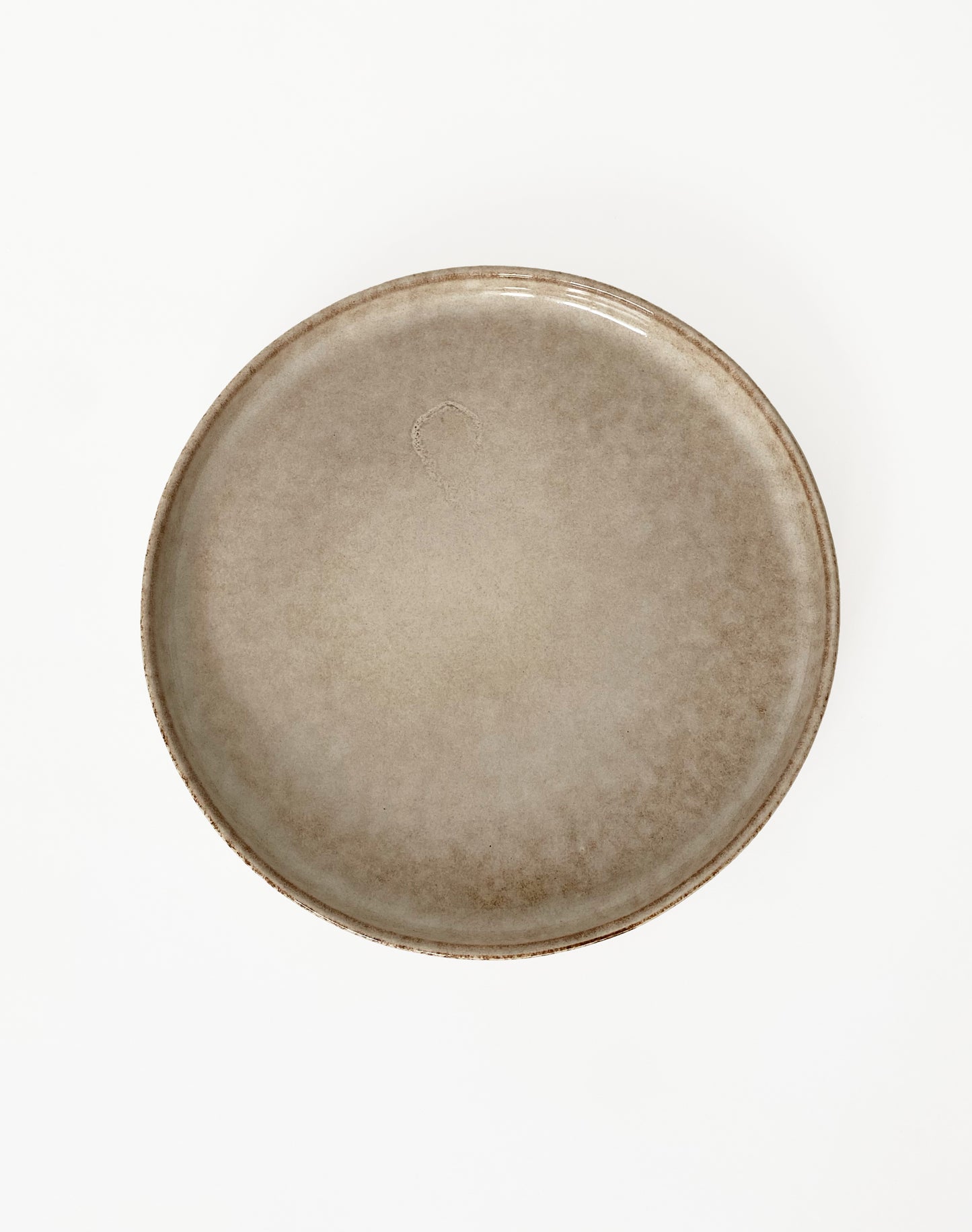 Assiette beige en grès