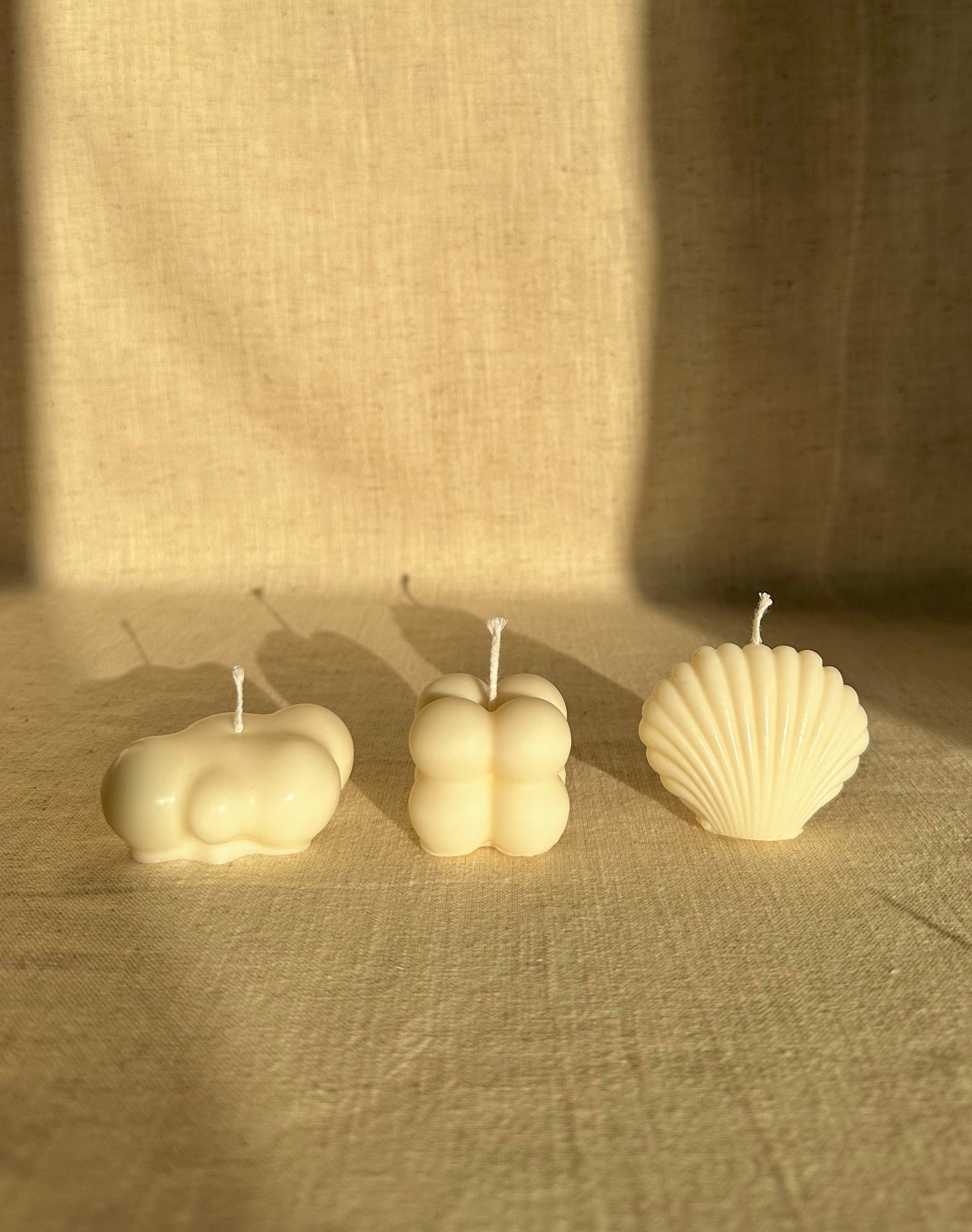 Trois mini bougies végétales blanches