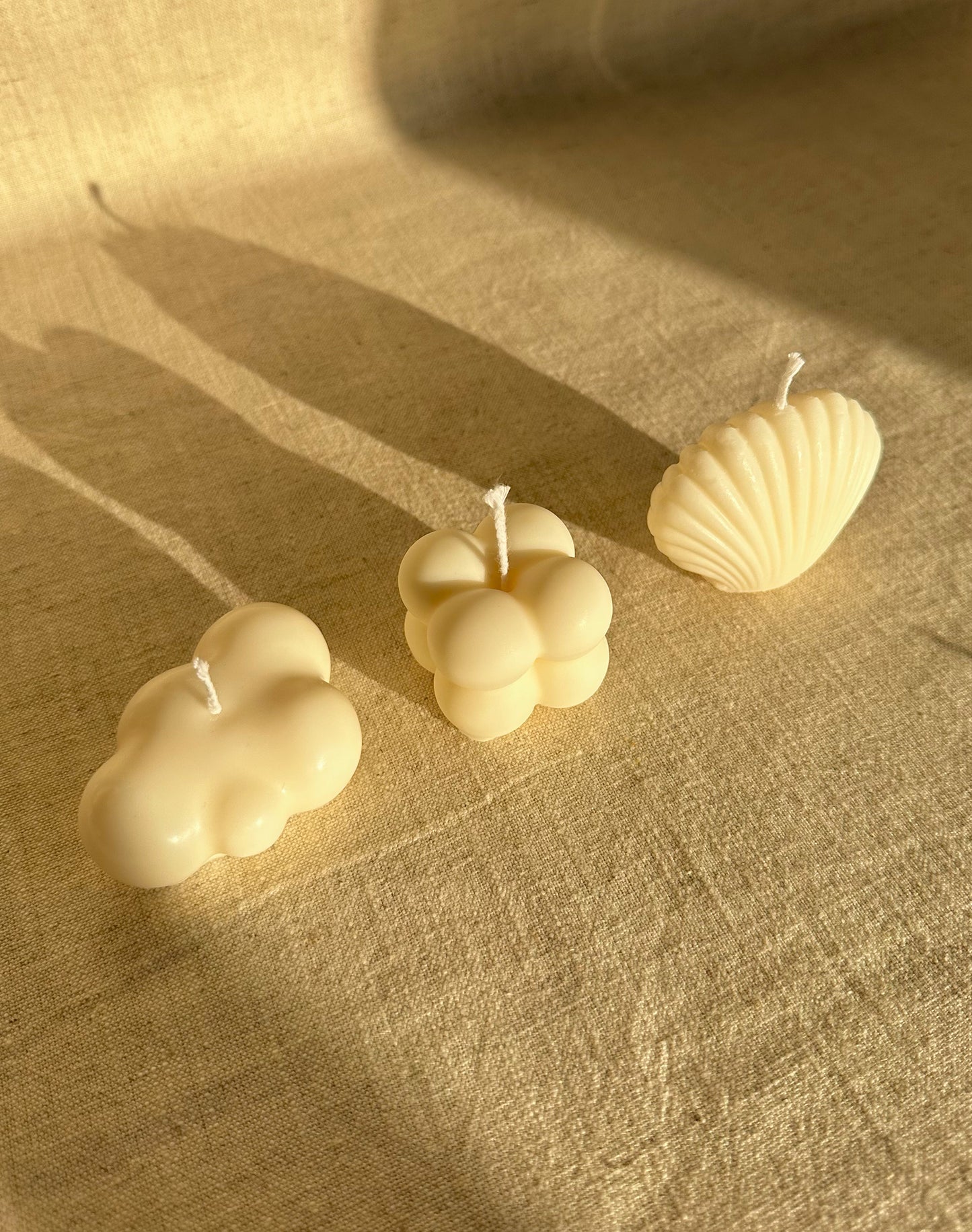 Trois mini bougies végétales blanches