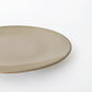 Assiette beige en grès